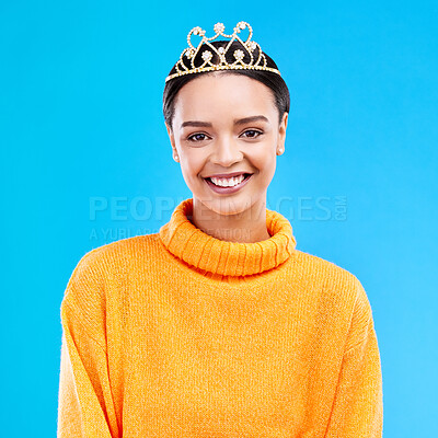 Buy stock photo Winner, crown and portrait of woman in studio for celebration, princess and party. Smile, beauty and fashion with female and tiara on blue background excited for achievement, winner and prom event
