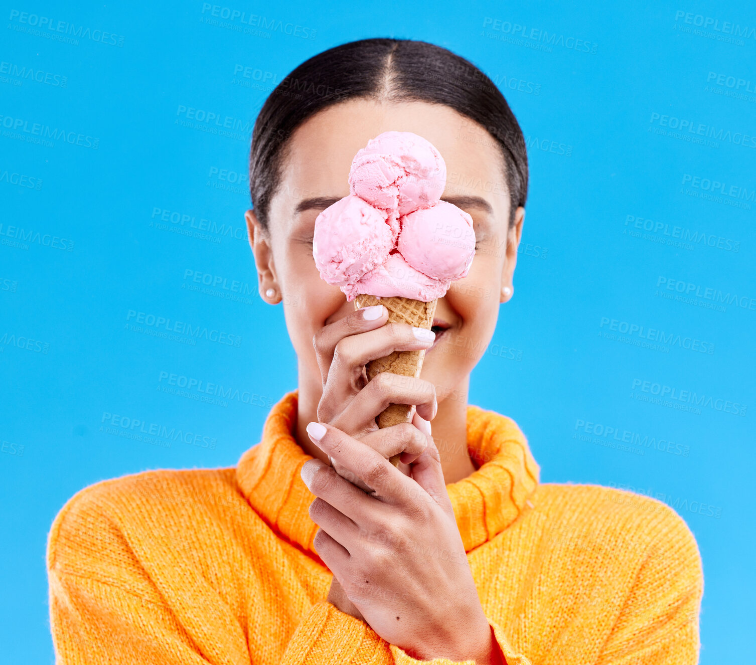Buy stock photo Ice cream, cover and hide with woman in studio for snack, dessert and sweets. Diet, summer and junk food with female and frozen gelato isolated on blue background for sugar, nutrition and mockup
