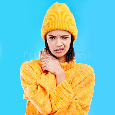 Buy stock photo Portrait of woman in winter fashion with doubt, beanie and attitude isolated on blue background. Style, confused face of gen z girl and studio backdrop, model in warm clothes for cold weather mockup.
