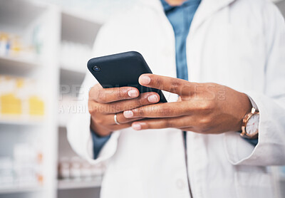 Buy stock photo Hands, phone and medicine with a pharmacist woman at work in a drugstore or dispensary for communication. Pharmacy, mobile or contact with a female professional in healthcare working at an apothecary