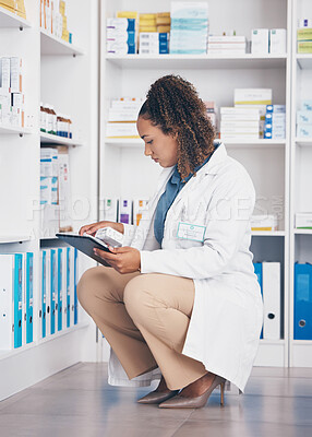 Buy stock photo Tablet, stock and health with a pharmacist woman at work to fill an online order or prescription. Healthcare, product and insurance with a female working as a medicine professional in a pharmacy