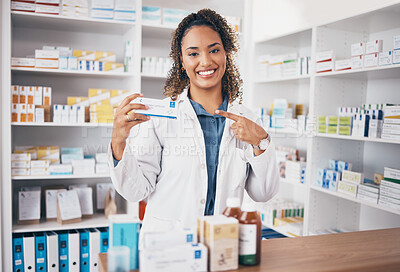 Buy stock photo Pointing, pharmacist or portrait of happy woman with medicine in customer services or wellness clinic. Healthcare help desk, pharmacy or doctor smiling to promote medication or pills on drugstore 