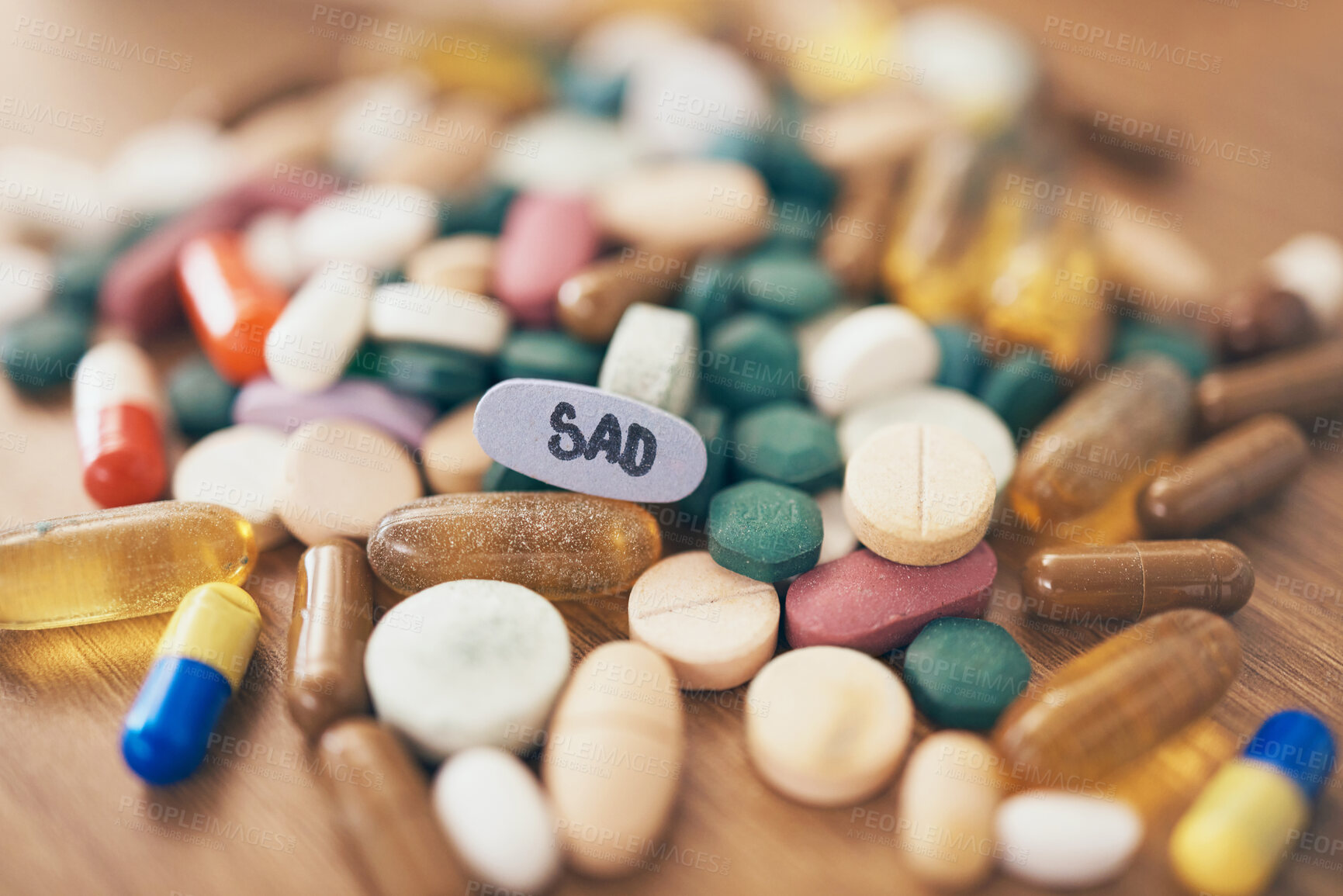 Buy stock photo Healthcare, depression or table with medicine pills or supplements products at drugstore clinic. Pharmaceuticals background, blur or medical vitamins, stress anxiety tablets or sad medication closeup