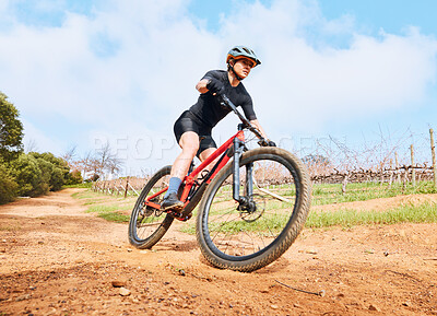 Buy stock photo Bicycle, fitness outdoor and woman on a cycling with freedom for sports race on gravel road. Fitness, exercise and athlete doing sport training in nature on park trail for cardio and healthy workout