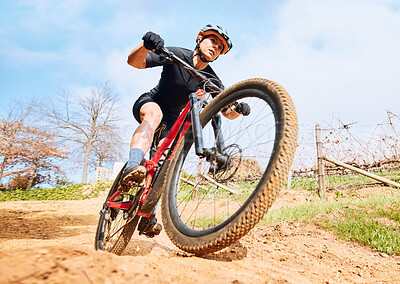 Buy stock photo Race, nature and a man on a bike for cycling, fitness and training in the countryside. Exercise, adventure and a professional cyclist riding a bicycle for a workout, cardio or sports practice