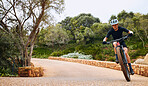 Path, nature and a man with a bike for cycling, fitness training and race. Exercise, active and a professional cyclist on a bicycle for a competition, cardio and sports in a park, road or countryside