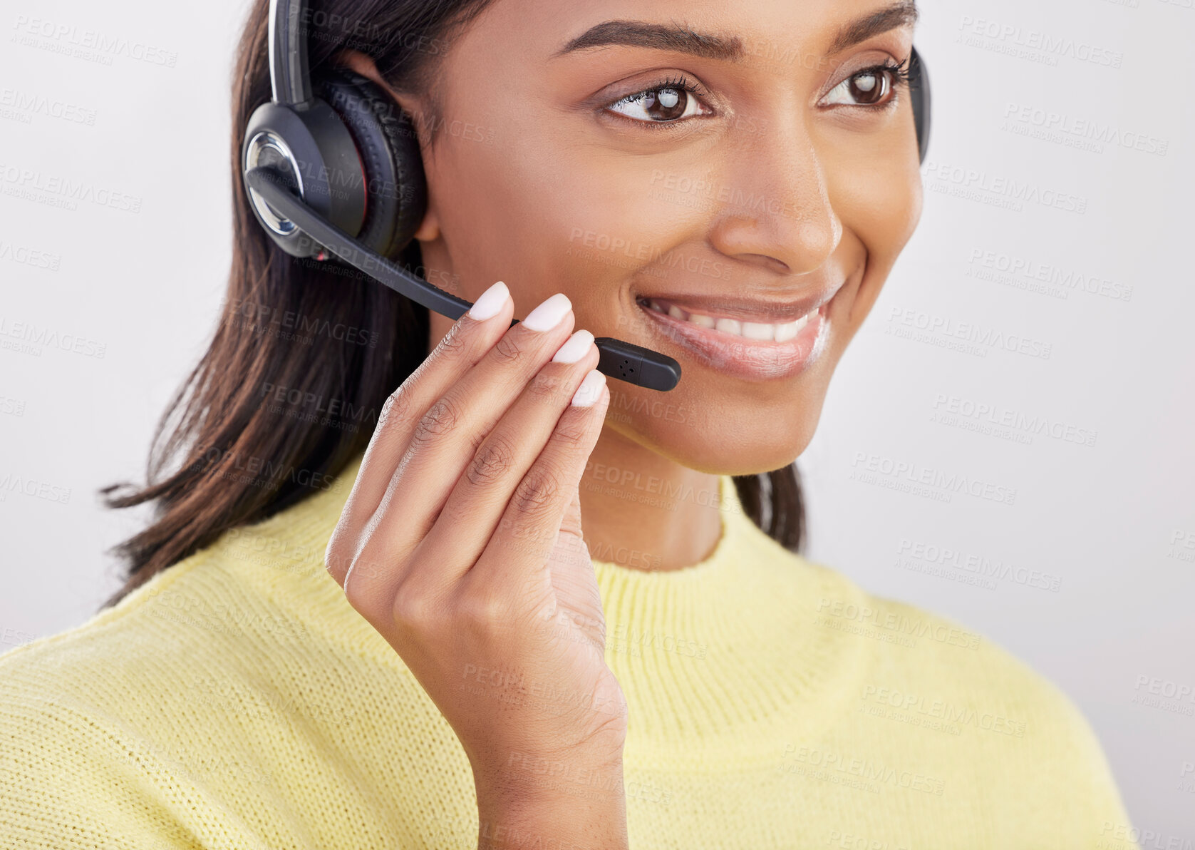 Buy stock photo Woman is happy, face with callcenter and headset with mic, CRM and contact us with consultant on studio background. Indian female smile with customer service agent and help desk with tech support