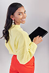 Happy, portrait and a woman with a tablet for an email, communication and the internet. White background, isolated and an Indian girl with technology for social media, business app and the web