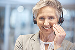 Portrait, smile and senior woman in call center in office with pride for customer service career. Face, telemarketing and happy, proud and confident sales agent, person or professional from Canada.