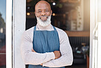 Black man, portrait smile and arms crossed in small business cafe or retail store by entrance door. Happy African American senior businessman standing in confidence at restaurant or coffee shop