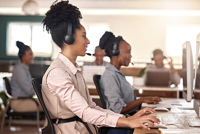 Buy stock photo Call center, black woman and computer on desk in office for customer service, sales or support. Agent or consultant team in telemarketing, telecom and crm or help desk in coworking workplace