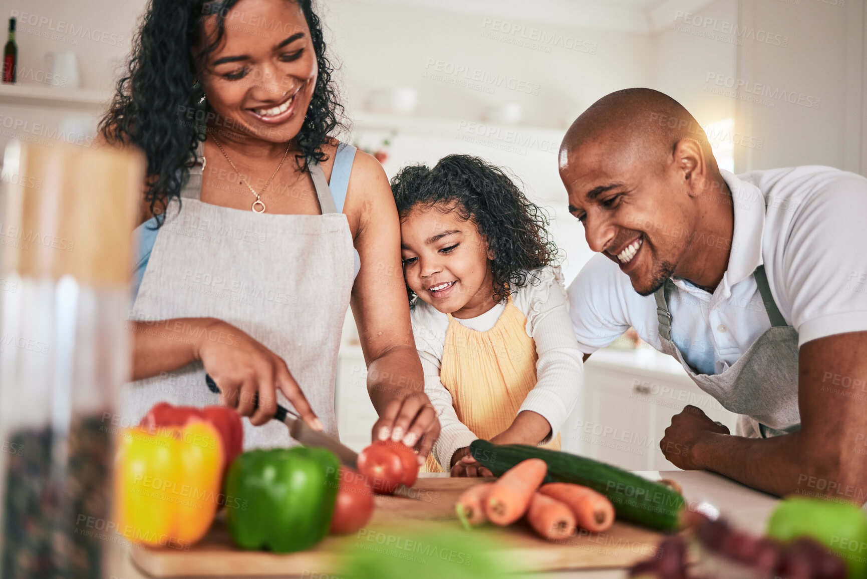 Buy stock photo Family, cut and cooking vegetables together or learning chef skill with parents and child in kitchen. Nutrition, healthy food and organic with people teaching and learn to cook at home with bonding