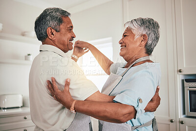 Buy stock photo Love, cooking and senior couple dancing in the kitchen together feeling happy, exited and bonding in a home. Care, happiness and romantic old people or lovers dance enjoying retirement in a house