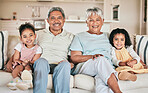 Family in portrait, grandparents and children with smile, relax at home with love and bonding together on sofa. Happiness with people in lounge, relationship and spending quality time at the weekend