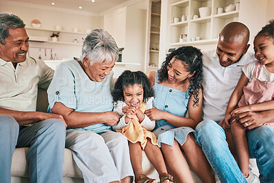 Buy stock photo Family, tickle and child with happy people in relax home with love and bonding together on sofa. Happiness, grandparents and parents with kids, generations and relationship with laughter or fun game