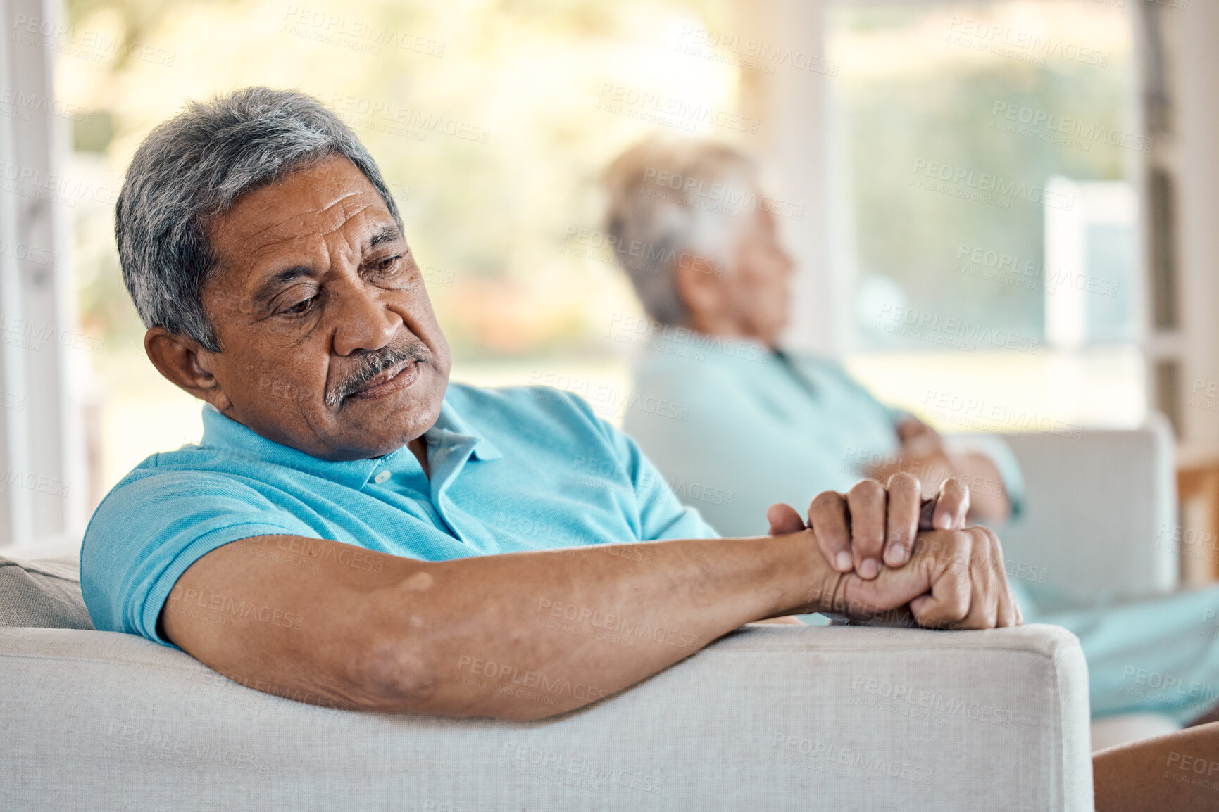 Buy stock photo Angry, senior couple and fighting on a sofa about divorce, breakup and separation in their home. Argue, depression and toxic elderly man with woman on couch after conflict, crisis or marriage problem