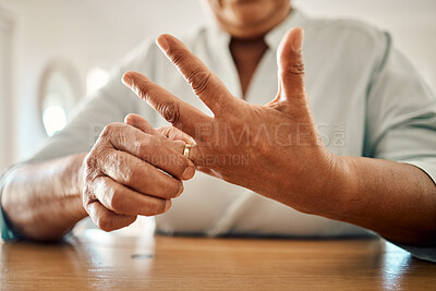 Buy stock photo Divorce, ring and hand of old woman at home for separation, breakup and conflict. Marriage problem, relationship issues and finish with wife finger and decision for change, disagree and leave