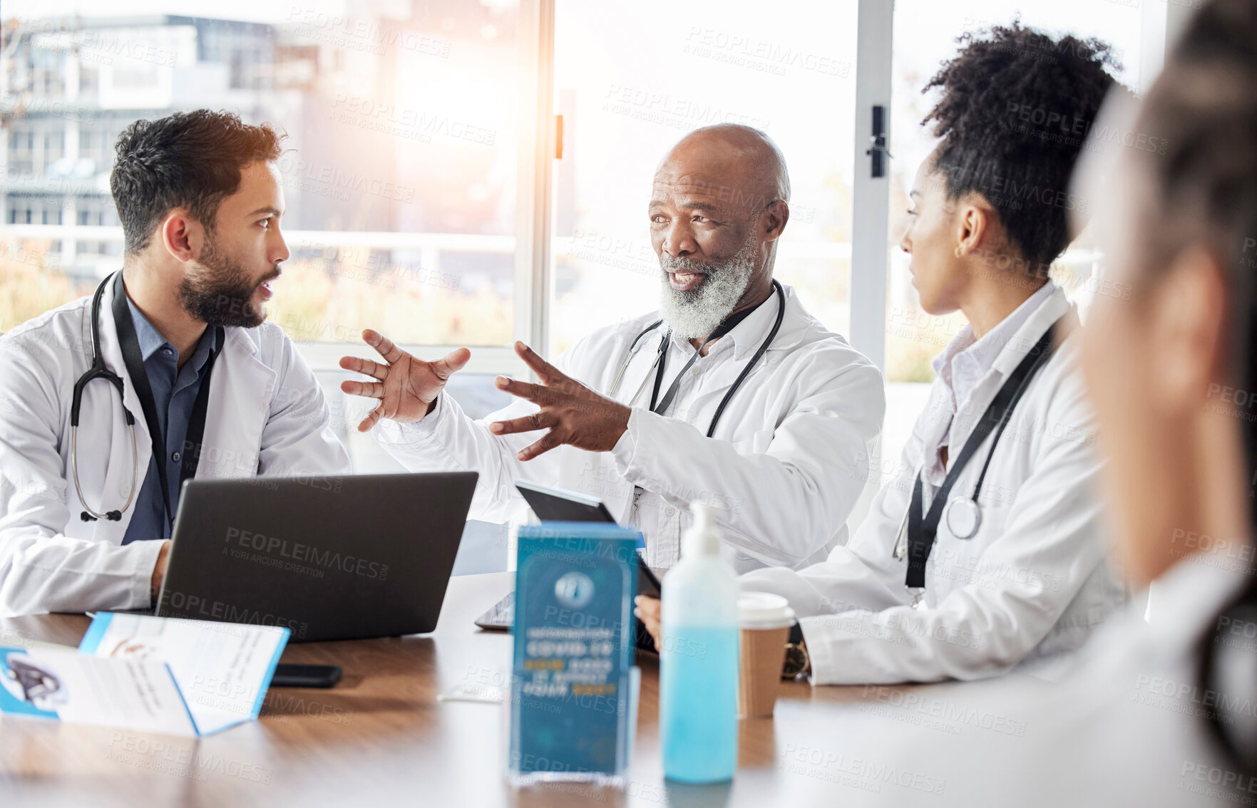 Buy stock photo Medical team, meeting and doctor speaker in a hospital conference room for healthcare seminar. Collaboration, teamwork and wellness staff in a conversation for doctors innovation and management