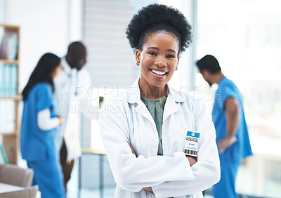 Buy stock photo Black woman, doctor leader and arms crossed in portrait at  clinic for goals, excited and career vision. Female medic, leadership and management with confidence, success and happy for job at hospital