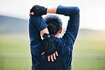 Fitness, workout and woman stretching her arms for outdoor training for a race, marathon or competition. Sports, health and back of a female athlete runner doing a warm up exercise before running.