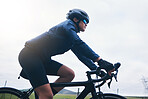 Woman, bicycle athlete and cycling on sky mockup outdoor, exercise and training for triathlon. Female cyclist, bike and fitness for sports marathon, cardio power and performance action of competition