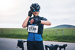 Woman, bicycle and outdoor to check heart rate, time or speed for race, challenge or adventure. Girl, bike and watch for health, fitness or gps on countryside road for cycling, contest or sport event