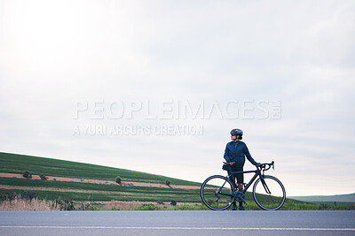 Buy stock photo Sports, woman and bicycle in countryside with sky mockup, athlete and thinking of cardio training goals. Female cyclist, bike and fitness with copy space, freedom and cycling performance in triathlon