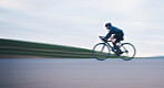 Speed, race and cycling with woman in road for training, competition and championship. Workout, sports and triathlon with female cyclist riding on bike for freedom, exercise and fast with motion blur