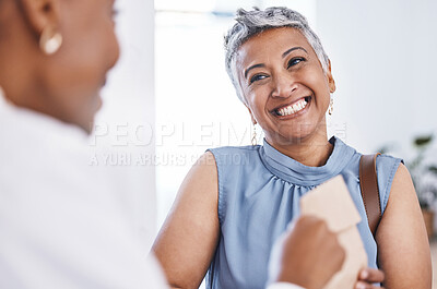 Buy stock photo Happy, medical and a woman customer in a pharmacy for medicine, talking to a professional consultant. Smile, healthcare and a mature female patient chatting to a pharmacist in a clinic or dispensary