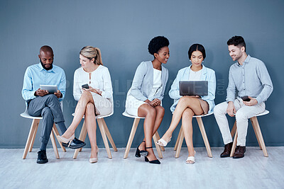 Buy stock photo Business people, meeting and waiting room for interview, networking or job opportunity at the office. Diversity and group of employees sitting in row for recruitment process, collaboration or hiring