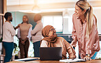 Business people, laptop and happy mentor talking to muslim woman at office desk for motivation. Entrepreneur women laugh in office for discussion about coaching, management and planning or training