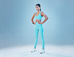 Exercise, focus and mockup with a sports woman in studio on a gray background for health or wellness. Fitness, mindset and space with a young female athlete training for a healthy body or lifestyle