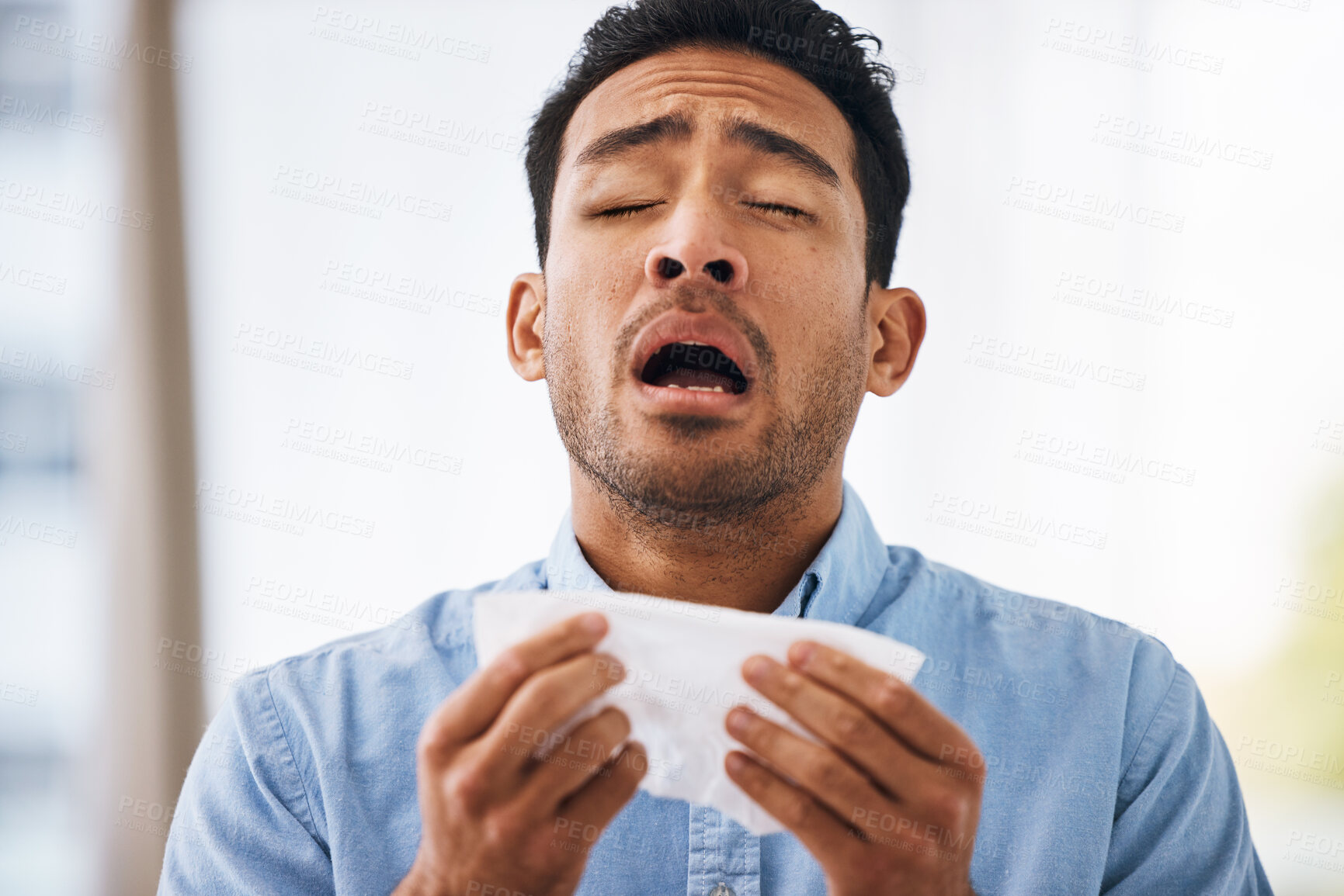 Buy stock photo Sick, sneeze and man with a tissue, allergies and sickness with symptoms, cold and illness. Male model, person and guy with congested with sinuses, toilet paper for nose and fever with health issue
