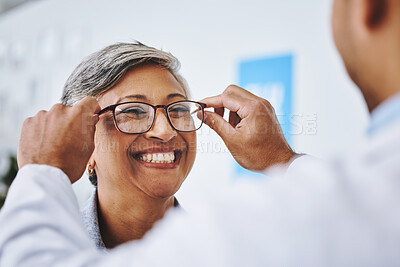 Buy stock photo Optometry, smile and woman with prescription glasses, optician and helping client with product. Female person, employee and optometrist assist with eyewear, clear vision and buying new spectacles