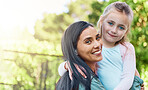 Portrait, outdoor and mother with girl, adoption and happiness on break, bonding and quality time. Face, mama and daughter embrace, hug and smile with joy, adopted and foster mom with female child