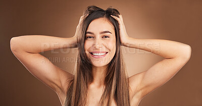 Buy stock photo Beauty, portrait and woman with hair care, happiness and  female against a brown studio background. Face, happy girl and person massage scalp, salon treatment and confidence with wellness and glow