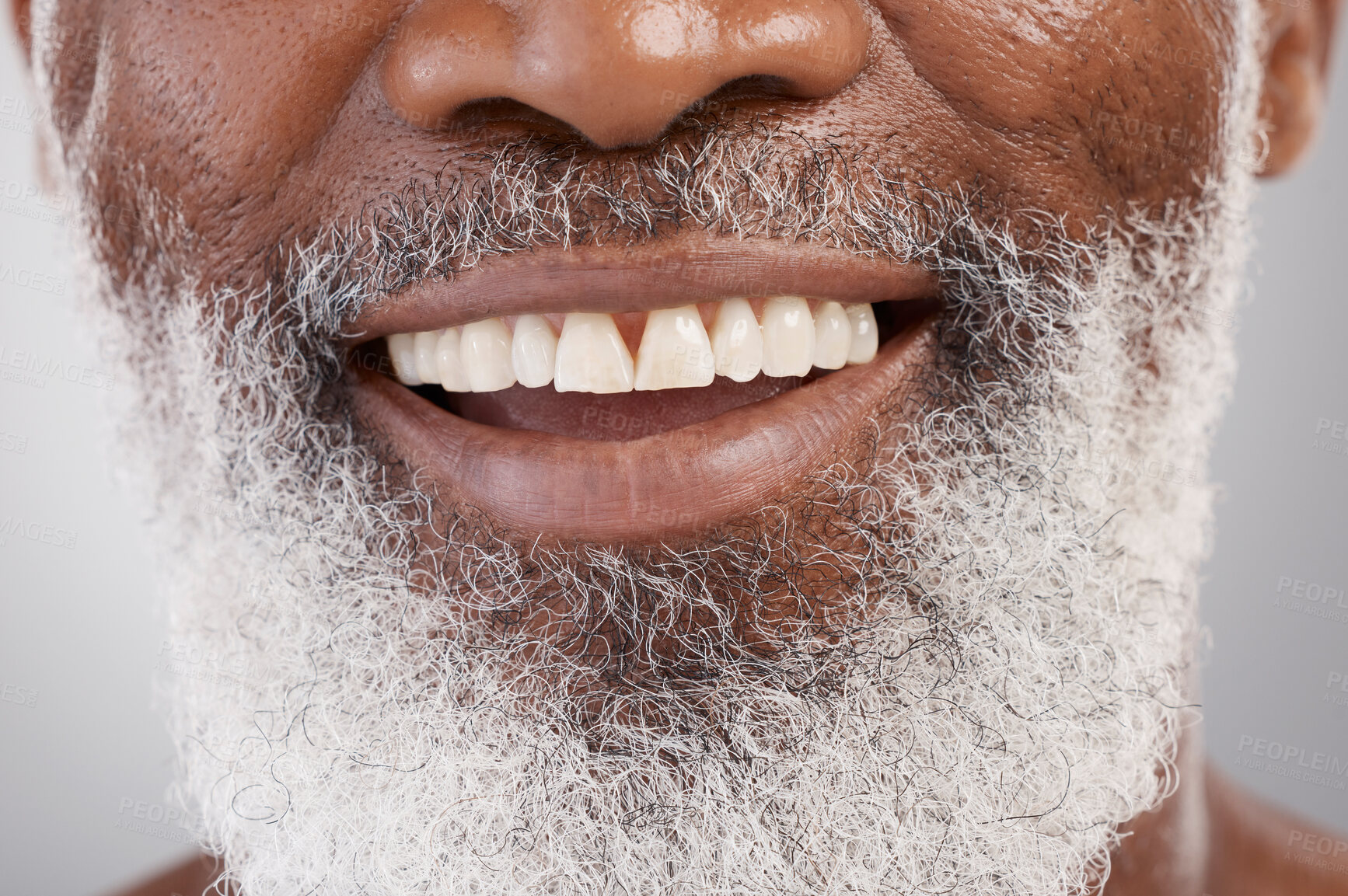 Buy stock photo Mouth, teeth and beard with a senior man in studio on a gray background for beauty, skincare or grooming. Dentist, smile and happy with a person closeup for dental care, oral hygiene or whitening