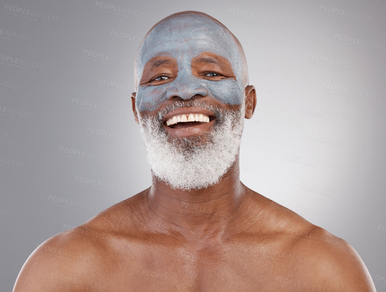 Buy stock photo Skincare, clay mask and portrait of black man with smile, happiness and anti ageing treatment on studio background. Dermatology, cosmetic grooming and happy, mature model in charcoal skin care facial