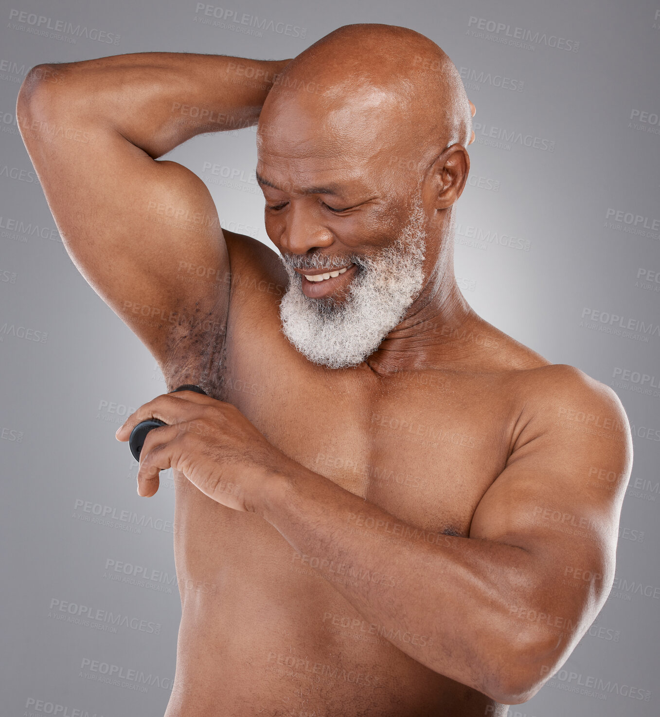 Buy stock photo Skincare, shaving armpit and black man with a smile, grooming and routine with guy against a dark studio background. Senior male, happy person and model with hygiene, cosmetics and hair removal