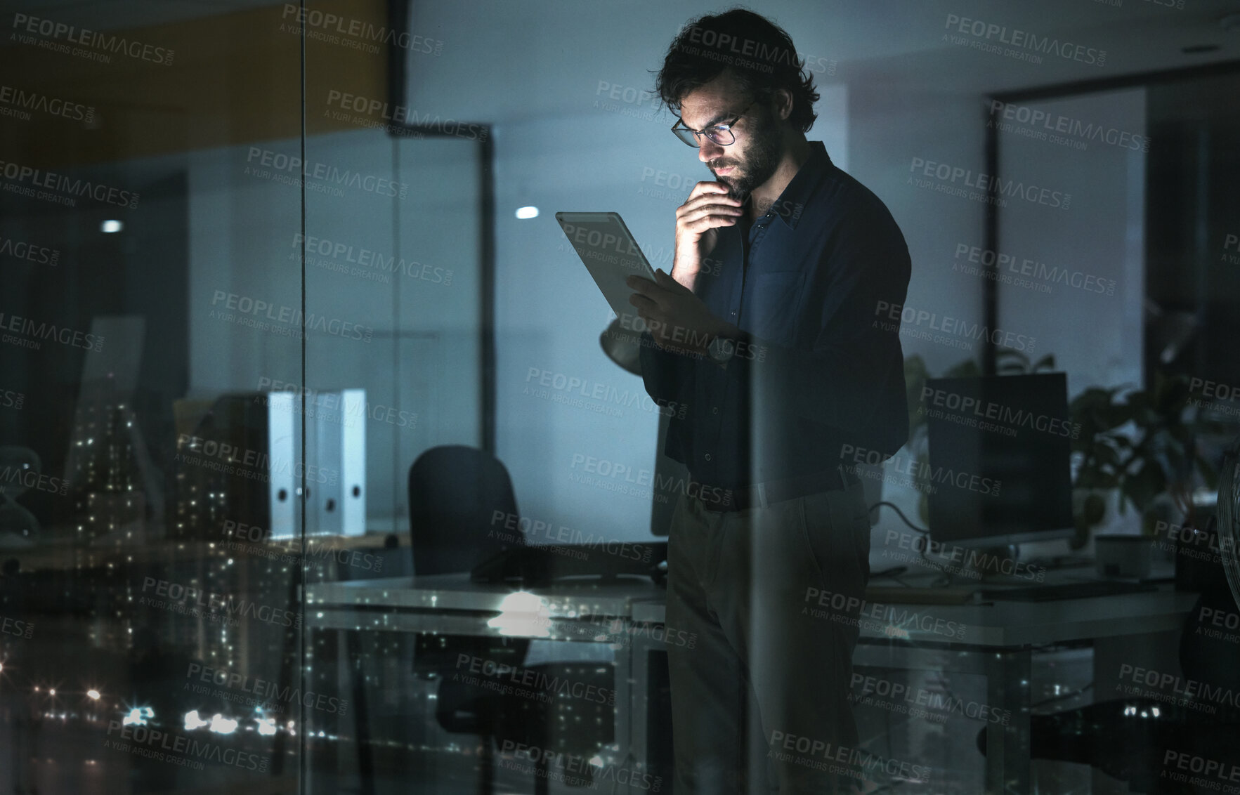 Buy stock photo Business man, tablet and thinking in office, problem solving or looking for solution by window with city lights at night. Technology, idea and professional person with touchscreen to focus on reading