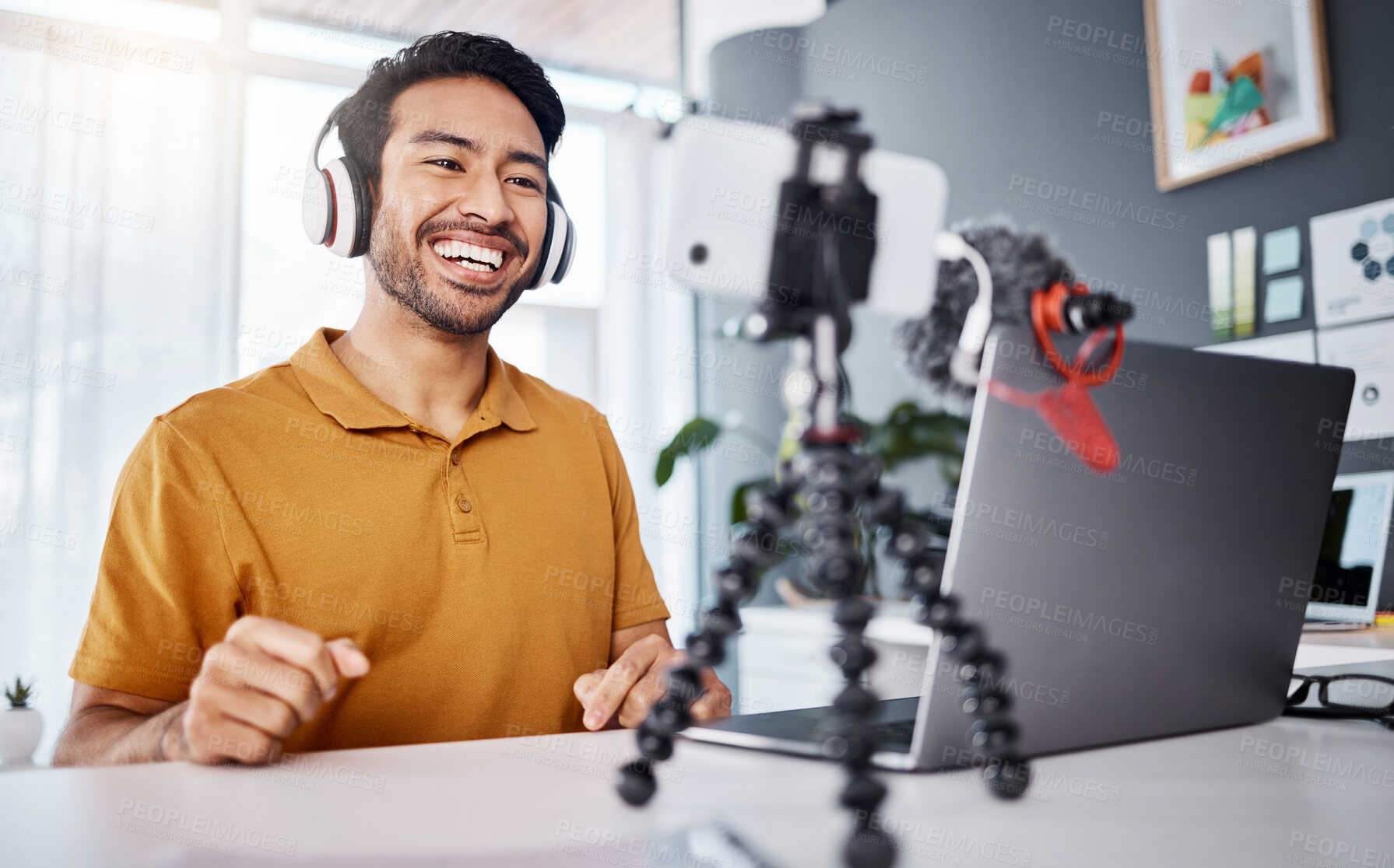 Buy stock photo Smile, streaming and an Asian man with a phone for a video call, communication or podcast. Happy, laughing and entrepreneur talking on a webinar, mobile broadcast or recording conversation in office