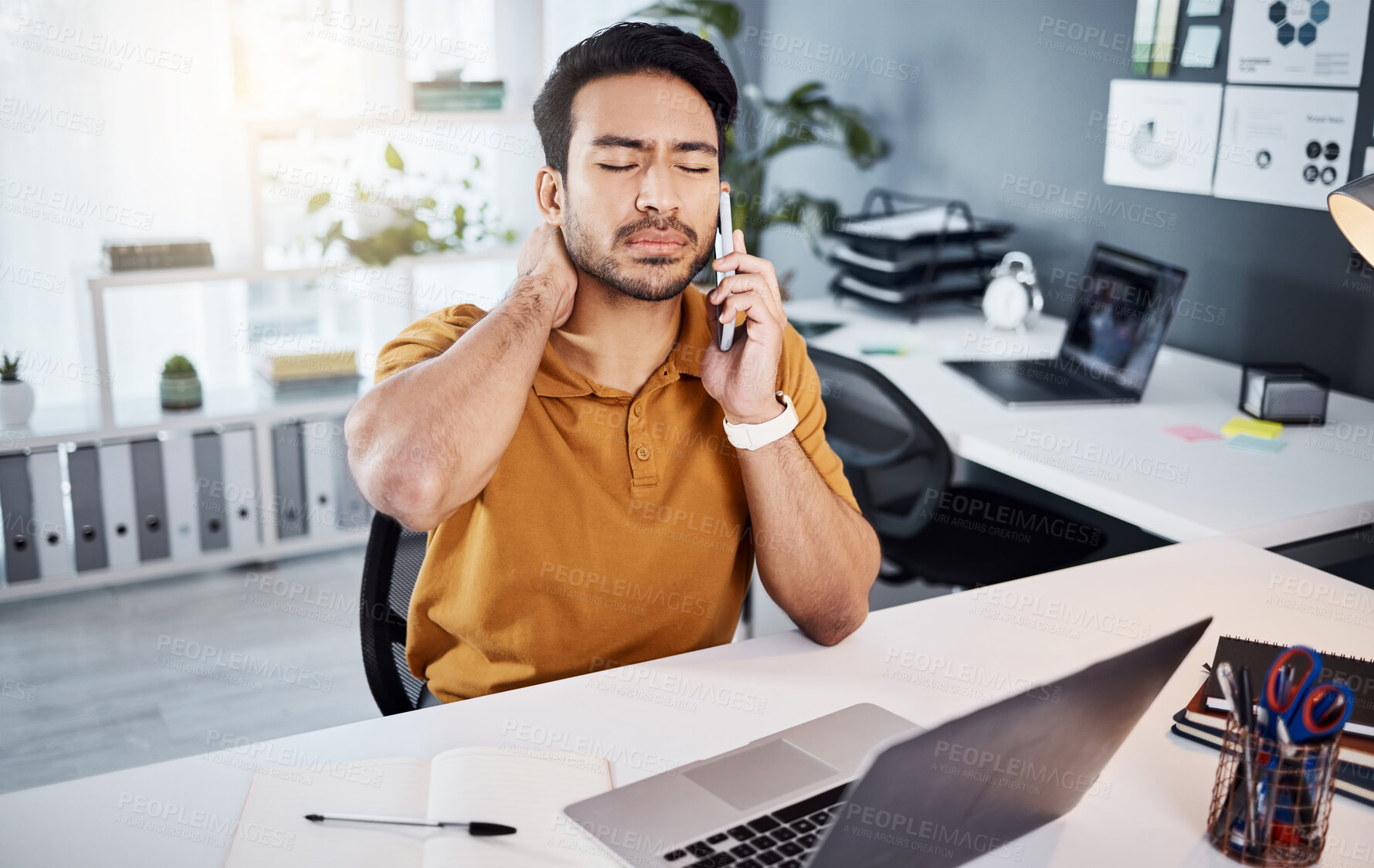 Buy stock photo Business man, phone call and neck pain or stress at office desk with a laptop and depression. Asian male entrepreneur with technology and depression, mental health or burnout while tired and working