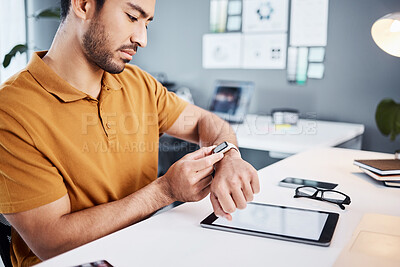 Buy stock photo Time check, notification and businessman with a watch at work for a project deadline or schedule. Technology, office and an Asian employee setting a timer, reading a message or communication on tech