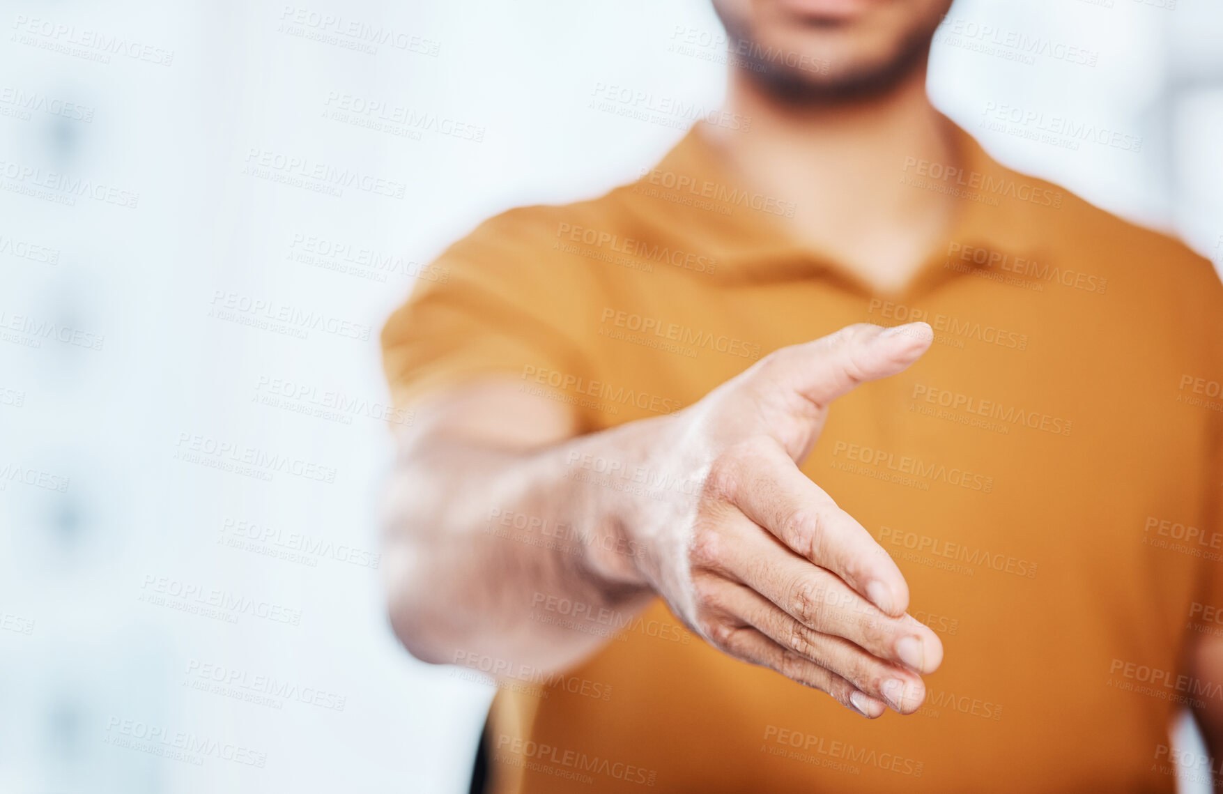 Buy stock photo Professional, greeting and businessman with a handshake gesture for a welcome, deal or partnership. Corporate, office and male employee reaching out a hand for shaking hands in agreement in workplace