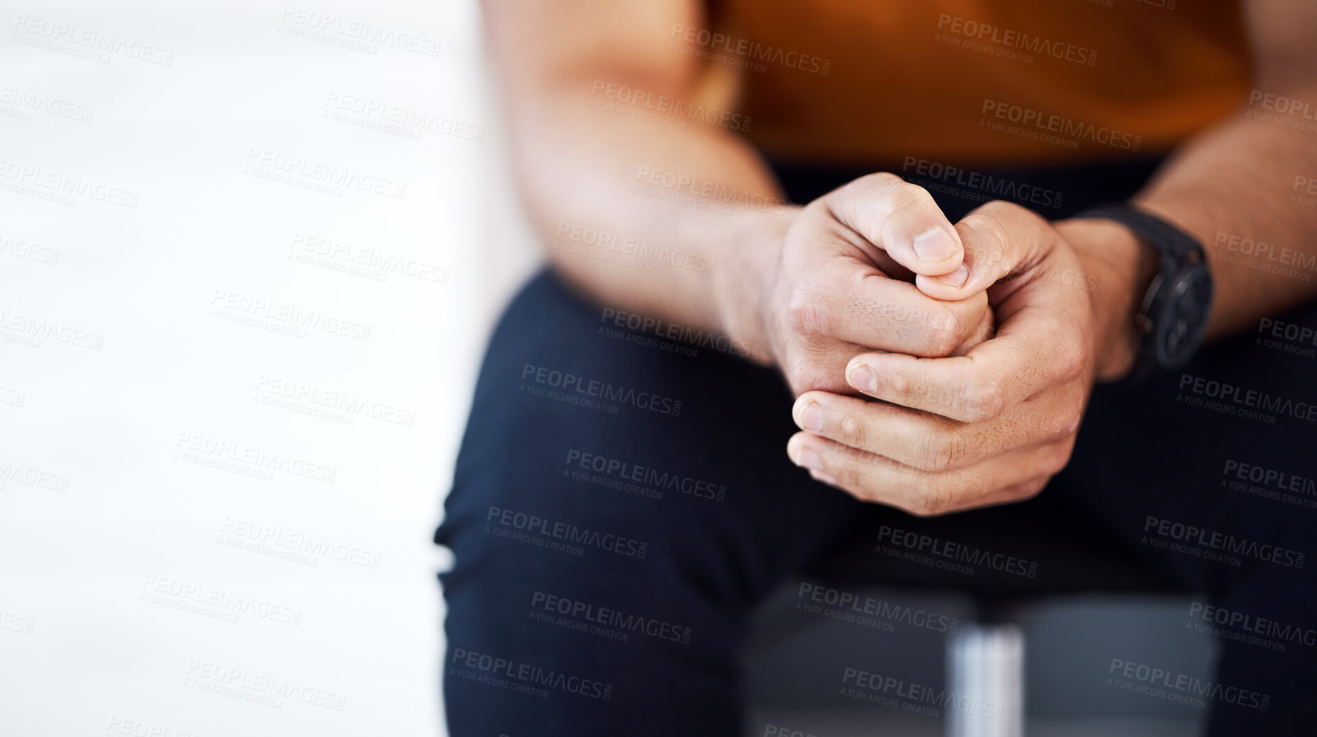 Buy stock photo Business man, waiting room and hands clasped for interview, recruitment or hiring in office mockup. Nervous, anxiety and male professional sitting to wait for human resources, onboarding and hr.