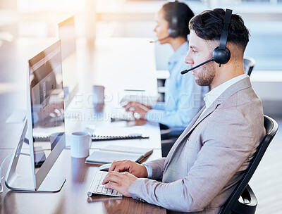 Buy stock photo Call center, computer and business with man in office for customer service, technical support or help desk. Telemarketing, contact us or communication for employee and serious operator in tech advice