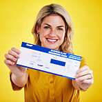 Happy woman, plane ticket and portrait smile for travel, flight or vacation against a yellow studio background. Female traveler smiling with boarding pass, passport or permit for traveling or trip