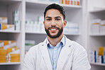 Pharmacy, pharmacist or portrait of man with smile in healthcare drugstore or hospital clinic alone. Face, wellness or happy male doctor smiling by medication or medicine on shelf ready to help 