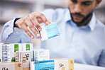 Pharmacy stock, man hands and medicine check of a customer in a healthcare and wellness store. Medical, drugs box and pharmaceutical label information checking of a female person by a shop shelf