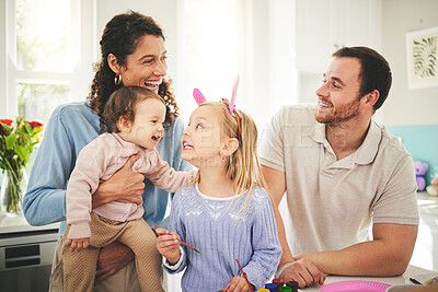 Buy stock photo Parents, girl children and bunny ears in family home with funny face, baby or happiness for easter. Man, woman and kids in house, laughing and excited for christian holiday with love, care or bonding